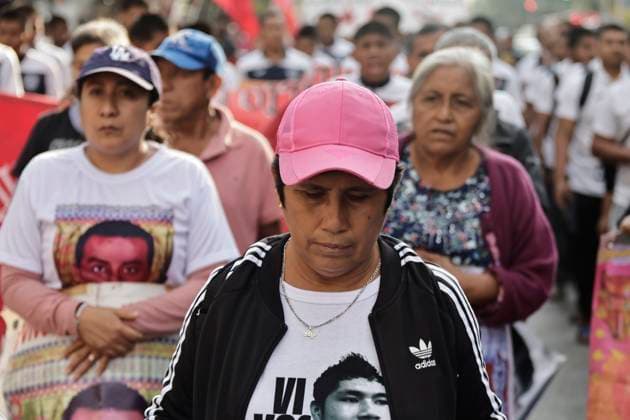 March 26, 2025, Mexico City, Cdmx, Mexico: Mothers, fathers, relatives, and classmates of the 43 students from Ayotzinapa, Guerrero, demonstrate on Paseo de la Reforma Avenue to demand that the government of Claudia Sheinbaum resolve the forced disappearance of the students, which occurred 10 years ago; the Mexican Army, the municipal police, and organized crime are being blamed for this incident. Mexico City Mexico - ZUMAp204 20250326_zip_p204_011 Copyright: xJosuexPerezx