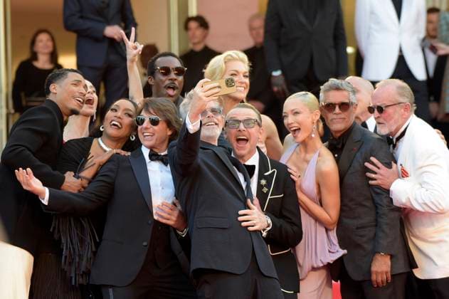 French actress Pom Klementieff, American actress Angela Bassett, actors Tom Cruise, Greg Tarzan Davis, Tarmell Tillman, Esai Morales, director Christopher McQuarrie, British actor Simon Pegg, actresses Hayley Atwell and Hannah Waddingham enjoy a selfie as they attend the premiere of Mission: Impossible- The Final Reckoning at the 78th Cannes Film Festival in Cannes, France on Wednesday May 14, 2025. CAN2025051451 RoccoxSpaziani