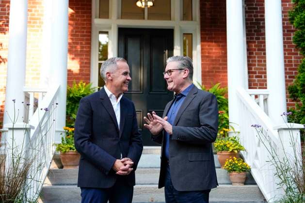 June 14, 2025, Ottawa, On, CANADA: Prime Minister Mark Carney greets Prime Minister of the United Kingdom Kier Starmer, outside his residence at Rideau Cottage in Ottawa, for a visit before the G7 Summit in Kananaskis, Alta., on Saturday, June 14, 2025. Ottawa CANADA - ZUMAc35_ 20250614_zaf_c35_202 Copyright: xJustinxTangx