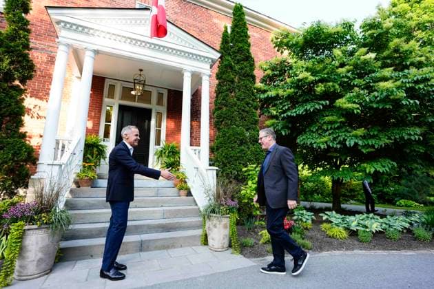 June 14, 2025, Ottawa, On, CANADA: Prime Minister Mark Carney greets Prime Minister of the United Kingdom Keir Starmer, outside his residence at Rideau Cottage in Ottawa, before the G7 Summit in Kananaskis, Alta., on Saturday, June 14, 2025. Ottawa CANADA - ZUMAc35_ 20250614_zaf_c35_217 Copyright: xJustinxTangx
