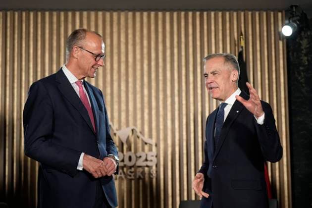 June 15, 2025, Kananaskis, Ab, Canada: Prime Minister Mark Carney meets with German Chancellor Friedrich Merz ahead of the G7 Summit at the Pomeroy Kananaskis Mountain Lodge, approximately 100km west of Calgary, in Kananaskis, Alta., Sunday, June 15, 2025. Kananaskis Canada - ZUMAc35_ 20250615_zaf_c35_221 Copyright: xAdrianxWyldx