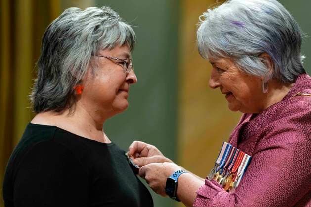 June 25, 2025, Ottawa, On, Canada: Gov. Gen. Mary Simon pins a Meritorious Service Cross on Phyllis Webstad of Williams Lake, B.C., during a ceremony at Rideau Hall in Ottawa, on Wednesday, June 25, 2025. Webstad inspired Orange Shirt Day, which is observed on September 30, where Canadians show their support for residential school survivors by wearing orange. Ottawa Canada - ZUMAc35_ 20250625_zaf_c35_057 Copyright: xJustinxTangx