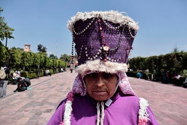 July 19, 2025, Chalco, State Of Mexico, Mexico: In the volcanic area, the celebration of SANTIAGO THE APOSTOLE, the patron saint of Chalco, State of Mexico, begins with the traditional Chinelos, native to Tlayacapan, Tepozotlan, and Yautepec, State of Morelos. These people dance through the streets wearing handmade costumes made with different fabrics, materials, paints, and masks. They originated during the colonial era to mock the Spanish, which is why their costumes have extravagant decorations and their masks resemble the faces, light skin, and colored eyes of the foreigners who invaded Mexico. The word Chinelo comes from the Nahuatl word meaning disguised Chalco Mexico - ZUMAp204 20250719_zip_p204_025 Copyright: xJosuexPerezx