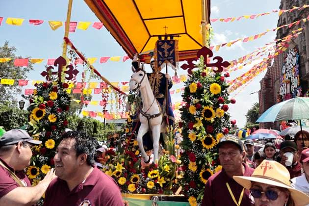 July 19, 2025, Chalco, State Of Mexico, Mexico: In the volcanic area, the celebration of SANTIAGO THE APOSTOLE, the patron saint of Chalco, State of Mexico, begins with the traditional Chinelos, native to Tlayacapan, Tepozotlan, and Yautepec, State of Morelos. These people dance through the streets wearing handmade costumes made with different fabrics, materials, paints, and masks. They originated during the colonial era to mock the Spanish, which is why their costumes have extravagant decorations and their masks resemble the faces, light skin, and colored eyes of the foreigners who invaded Mexico. The word Chinelo comes from the Nahuatl word meaning disguised Chalco Mexico - ZUMAp204 20250719_zip_p204_033 Copyright: xJosuexPerezx