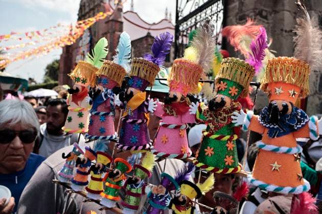 July 19, 2025, Chalco, State Of Mexico, Mexico: In the volcanic area, the celebration of SANTIAGO THE APOSTOLE, the patron saint of Chalco, State of Mexico, begins with the traditional Chinelos, native to Tlayacapan, Tepozotlan, and Yautepec, State of Morelos. These people dance through the streets wearing handmade costumes made with different fabrics, materials, paints, and masks. They originated during the colonial era to mock the Spanish, which is why their costumes have extravagant decorations and their masks resemble the faces, light skin, and colored eyes of the foreigners who invaded Mexico. The word Chinelo comes from the Nahuatl word meaning disguised Chalco Mexico - ZUMAp204 20250719_zip_p204_035 Copyright: xJosuexPerezx