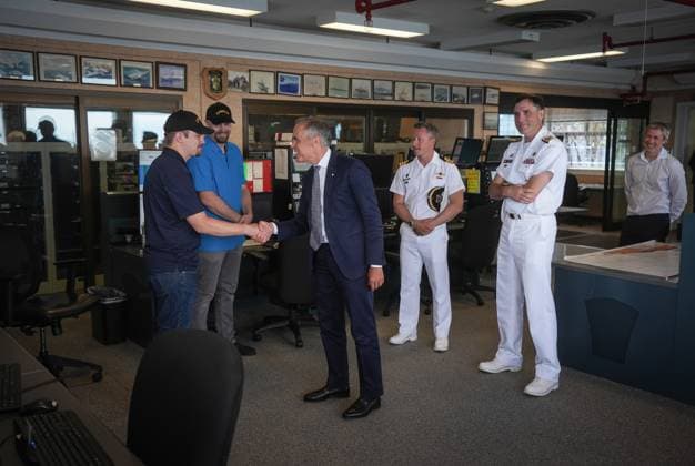 August 4, 2025, Nanoose Bay, Bc, CANADA: Prime Minister Mark Carney greets the people staffing the Canadian Forces Maritime Experimental and Test Ranges (CFMETR) operations centre, on the Winchelsea Islands, near Nanoose Bay, B.C.,, on Monday, August 4, 2025. Nanoose Bay CANADA - ZUMAc35_ 20250804_zaf_c35_037 Copyright: xDarrylxDyckx