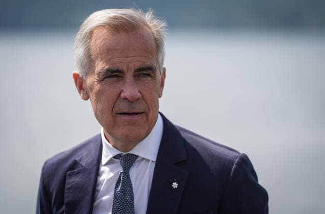 August 4, 2025, Nanoose Bay, Bc, CANADA: Prime Minister Mark Carney listens while touring the Royal Canadian Navy torpedo recovery vessel Sikanni at the Canadian Forces Maritime Experimental and Test Ranges (CFMETR), in Nanoose Bay, B.C.,, on Monday, August 4, 2025. Nanoose Bay CANADA - ZUMAc35_ 20250804_zaf_c35_083 Copyright: xDarrylxDyckx