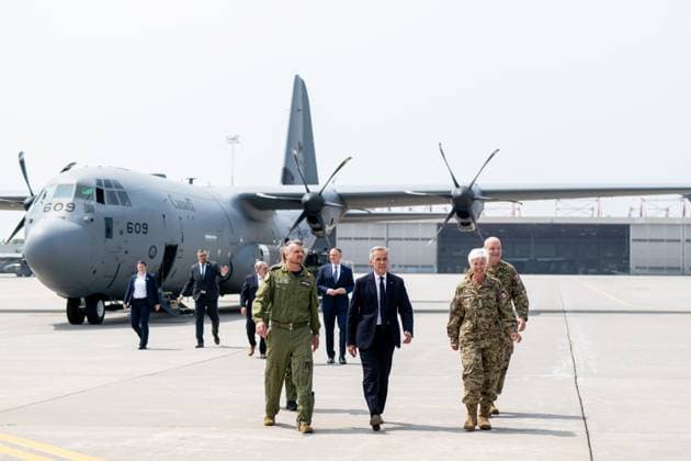 August 8, 2025, Trenton, On, Canada: Prime Minister Mark Carney, centre, and Chief of the Defence Staff General Jennie Carignan, right, walk on the tarmac of Canadian Forces Base (CFB) 8 Wing Trenton in Trenton Ont., on Friday, Aug. 8, 2025. Trenton Canada - ZUMAc35_ 20250808_zaf_c35_027 Copyright: xSpencerxColbyx