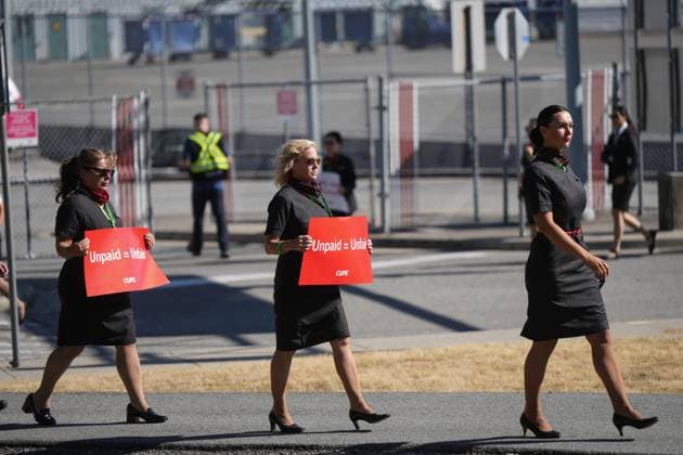 August 11, 2025, Richmond, Bc, CANADA: Air Canada flight attendants arrive at Vancouver International Airport to hold a silent protest on a national day of action, as labour negotiations between the Canadian Union of Public Employees and the airline continue, in Richmond, B.C., on Monday, Aug. 11, 2025. Richmond CANADA - ZUMAc35_ 20250811_zaf_c35_007 Copyright: xDarrylxDyckx