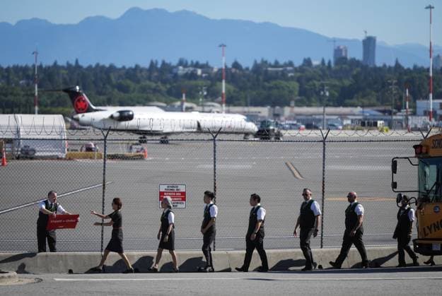 August 11, 2025, Richmond, Bc, CANADA: Air Canada flight attendants arrive at Vancouver International Airport to hold a silent protest on a national day of action, as labour negotiations between the Canadian Union of Public Employees and the airline continue, in Richmond, B.C., on Monday, Aug. 11, 2025. Richmond CANADA - ZUMAc35_ 20250811_zaf_c35_008 Copyright: xDarrylxDyckx