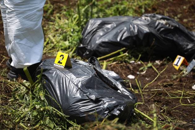 Human remains found during a search operation for missing persons in Mexico STATE OF MEXICO, MEXICO - AUGUST 26: Human remains inside bags are secured by forensic experts during a search operation, at the Sierra de Guadalupe, in the State of Mexico, Mexico on August 26, 2025. Human remains were found in the mountainous area of Sierra de Guadalupe during a search operation carried out by relatives of missing persons, members of the National Guard, collectives and members of the Investigation Police, among others. The number of people reported as disappeared continues to rise in the country, now exceeding 130,000 Daniel Cardenas Anadolu State of Mexico Mexico. Editorial use only. Please get in touch for any other usage. Copyright: x2025xAnadoluxDanielxCardenasx