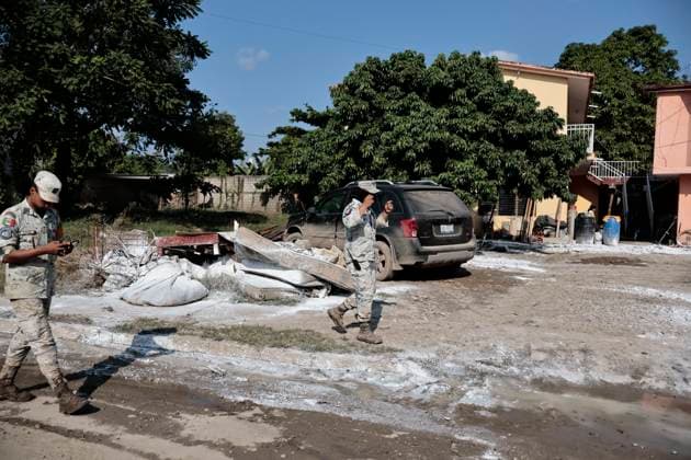 October 17, 2025, Veracruz, Poza Rica, Mexico: One week after Tropical Storm RAYMOND caused severe damage and flooding in Poza Rica, Veracruz, a caravan of Mexican Red Cross personnel delivered humanitarian aid, provided health services, and provided free internet access to contact or search for missing relatives in the most affected areas of this municipality. The oÂlamo region was the hardest hit, where water swept away vehicles and furniture, and even completely covered some homes due to overflowing rivers. This also damaged communication and electricity services. The cleanup work has been carried out largely by residents themselves, as they are in areas that are difficult to access due to the enormous amount of mud covering their stre - ZUMAp204 20251017_zip_p204_068 Copyright: xJosuexPerezx