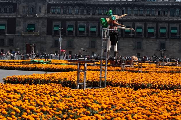 October 25, 2025, Mexico, Cdmx, Mexico: In honor of the Day of the Dead celebrations throughout Mexico, the city government opened the doors to thousands of visitors to appreciate the 2025 Day of the Dead Monumental Offering in the Plaza de la Constitucio³n. This installation of alebrijes and cartoneroÂa (paper carvings) was subject to voting; various projects competed, but the winning artists, who were in charge of the installation and assembly, were the ZION ART STUDIO COLLECTIVE. They created a representation of the pilgrimage of the inhabitants of the mythical Aztlan to Mexico Cityâ€Tenochtitlan. The pieces stand out for their size and for depicting the jaguar, the axolotl, the Xoloitzcuintle dog, the Red Queen, among other en - ZUMAp204 20251025_zip_p204_012 Copyright: xJosuexPerezx