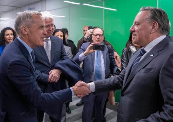 November 14, 2025, Montreal, Pq, CANADA: Prime Minister Mark Carney, left greets Quebec Premier Francois Legault as they arrive at McGill station in downtown Montreal for the REM light rail inaugural run to Deux-Montagnes, Que., in Montreal, on Friday, Nov. 14, 2025. Montreal CANADA - ZUMAc35_ 20251114_zaf_c35_021 Copyright: xChristinnexMuschix