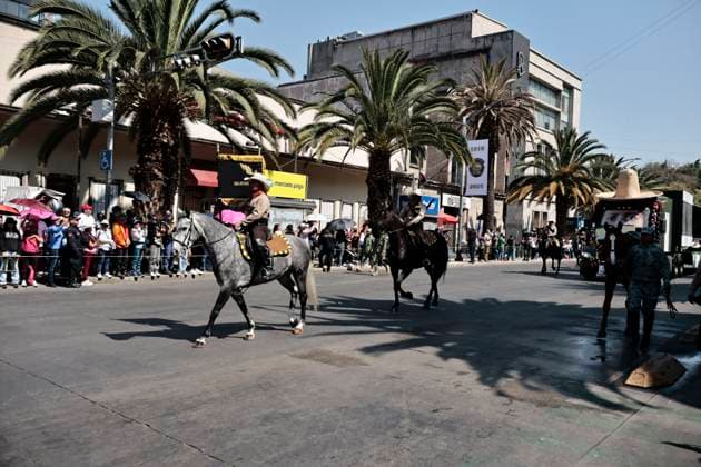November 20, 2025, Mexico, Cdmx, Mexico: As part of the celebration of the 115th Anniversary of the Mexican Revolution, hundreds of soldiers dressed as charros and escaramuzas, in period attire, on horseback, and in a caravan of trucks adorned with giant sombreros, paraded down Avenida Juo¡rez for locals and visitors to enjoy the spectacle prepared by the Army, Navy, and National Guard. Mexico Mexico - ZUMAp204 20251120_zip_p204_053 Copyright: xJosuexPerezx