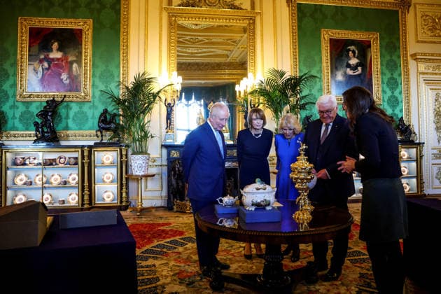 German President Frank-Walter Steinmeier visits Britain Britain s King Charles, Queen Camilla, German President Frank-Walter Steinmeier and his wife Elke Buedenbender view items on display relating to Germany, during a visit to the Royal Collection exhibition in the Green Drawing Room at Windsor Castle, during Steinmeier s state visit to Britain, in Windsor, Britain, December 3, 2025. REUTERS Hannah, Credit:Hannah McKay Avalon UNITED KINGDOM, Windsor Copyright: xHannahxMcKayx xAvalonx 1056255968