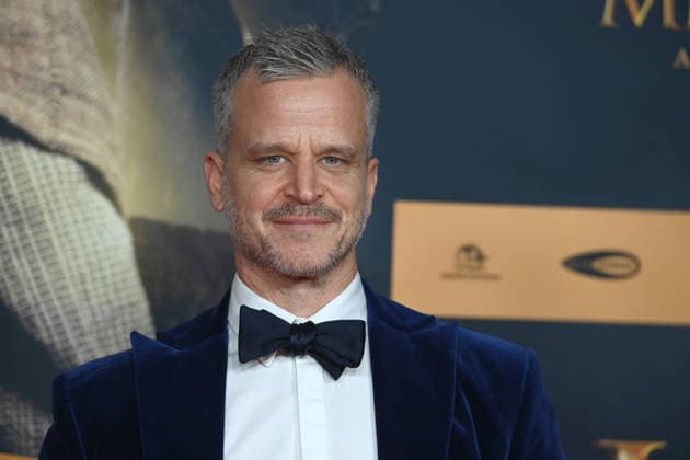 Mate HAUMANN, Schauspieler, Portraet, Porträt, Portrait, Angeschnittenes Einzelbild, Einzelmotiv, Roter Teppich, Red Carpet Show, Ankunft, arrival, Filmpremiere DER MEDICUS 2 am 15.12.2025 im Cinedom-Kino in Koeln,