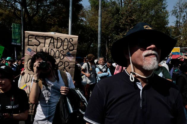 January 10, 2026, Mexico City, Cdmx, Mexico: Mexican protesters and social organizations are demonstrating against the actions of US President DONALD TRUMP against Venezuela and its former president, NICOLAS MADURO. With posters, giant banners, and Venezuelan flags, they are showing their support for MADURO and his vice president, DELCY RODRIGUEZ, who has assumed the presidency due to the country s situation. Chanting slogans like Yankees out of Latin America and Trump, imperialist terrorist, the protesters are demanding the immediate release of NICOLAS MADURO, whom they claim is being held captive by DONALD TRUMP. This comes as protests against these actions spread worldwide, with many believing TRUMP S true objective is to seize V - ZUMAp204 20260110_zip_p204_041 Copyright: xJosuexPerezx