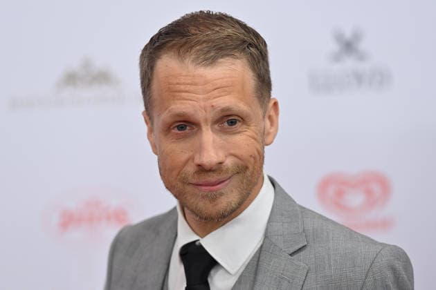 Oliver POCHER (Moderator,Coemdian), Einzelbild,angeschnittenes Einzelmotiv,Portraet,Portrait,Porträt. 50.Deutscher Filmball, Roter Teppich,Red Carpet, am 24.01.2026 im H o t e l B a y e r i s c h e r H o f, M u e n c h e n.