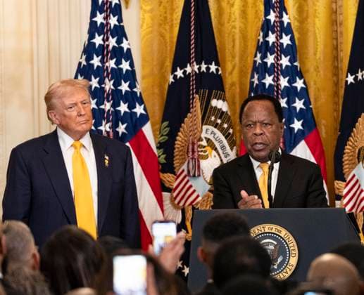 February 18, 2026, Washington, District Of Columbia, USA: Attorney Leo Terrell, right, makes remarks as United States President Donald J Trump, left, listens during a Black History Month Reception in the East Room of the White House in Washington, DC, USA, on Wednesday, February 18, 2026 Washington USA - ZUMAs152 20260218_faa_s152_030 Copyright: xAndrewxThomasx