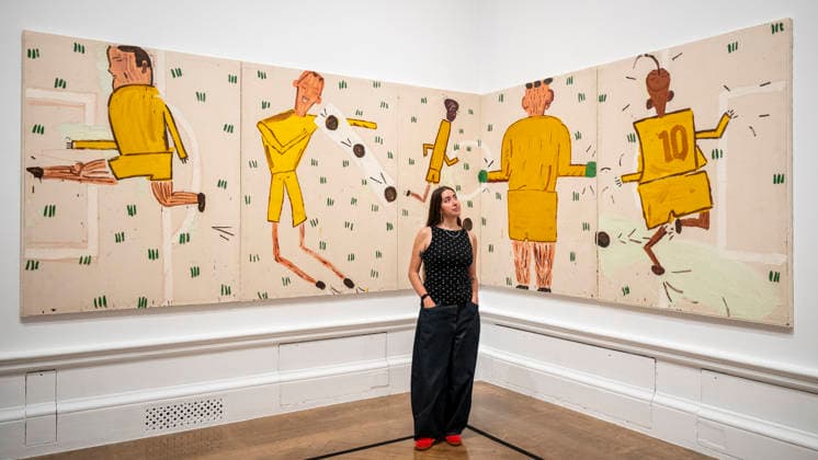 February 24, 2026, London, London, UK: LONDON, UK. A staff member with ‘Yellow Stripâ€⠢, 2006, at a preview of ‘Rose Wylie: The Picture Comes Firstâ€⠢, the largest survey of the work of Rose Wylie, RA, at the Royal Academy of Arts. The exhibition presents over 90 of her works from 28 February to 19 April 2026. London UK - ZUMAl94_ 20260224_zaf_l94_040 Copyright: xStephenxChungx