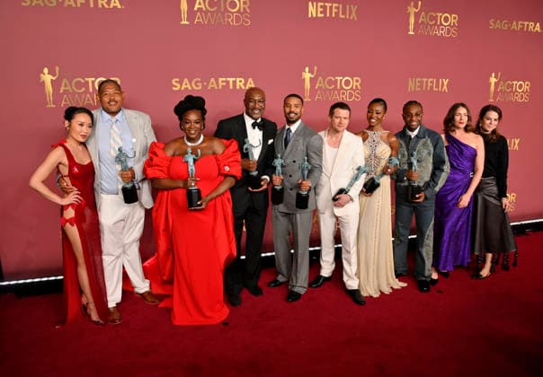 Li Jun Li, Omar Benson Miller, Wunmi Mosaku, Delroy Lindo, Michael B. Jordan, Jack O Connell, Jayme Lawson, Miles Caton, and Lola Kirke, winners of the Outstanding Performance by a Cast in a Motion Picture Award for Sinners, appear backstage during the 32nd annual SAG Awards held at the Shrine Auditorium in Los Angeles on Sunday, March 1, 2026. LAP20260301149 JIMxRUYMEN