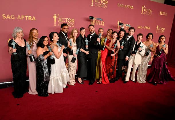 Joanna Going, Krystel V. McNeil, Tracy Vilar, Kristin Villanueva, Brandon Mendez Homer, Taylor Dearden, Fiona Dourif, Noah Wyle, Alexandra Metz, Tracy Ifeachor, Isa Briones, Jalen Thomas Brooks, Patrick Ball, Gerran Howell, Supriya Ganesh and Amielynn Abellera, winners of the Outstanding Performance by an Ensemble in a Drama Series award for The Pitt, appear backstage during the 32nd annual SAG Awards held at the Shrine Auditorium in Los Angeles on Sunday, March 1, 2026. LAP20260301166 JIMxRUYMEN