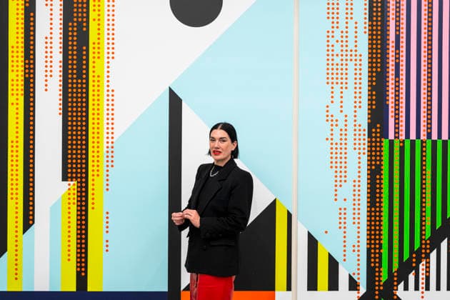 March 10, 2026, London, London, UK: LONDON, UK. British-American artist Sarah Morris poses with ‘Bank of Chinaâ€⠢, 2025, at a preview of ‘Snow Leopards and Skyscrapersâ€⠢, her new exhibition at White Cube Masonâ€⠢s Yard. The show, which runs 11 March to 9 May, features a series of new paintings that examine global corporations alongside two films set in New York: her latest, Chris Rock (2025), focusing on the American comedian, and her first film Midtown (1998) London UK - ZUMAl94_ 20260310_zaf_l94_005 Copyright: xStephenxChungx