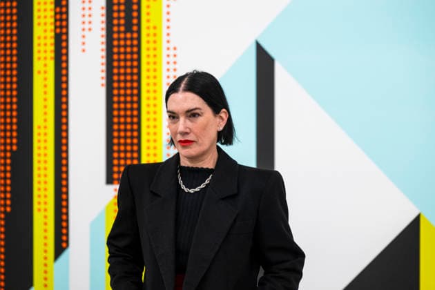 March 10, 2026, London, London, UK: LONDON, UK. British-American artist Sarah Morris poses with ‘Bank of Chinaâ€⠢, 2025, at a preview of ‘Snow Leopards and Skyscrapersâ€⠢, her new exhibition at White Cube Masonâ€⠢s Yard. The show, which runs 11 March to 9 May, features a series of new paintings that examine global corporations alongside two films set in New York: her latest, Chris Rock (2025), focusing on the American comedian, and her first film Midtown (1998) London UK - ZUMAl94_ 20260310_zaf_l94_012 Copyright: xStephenxChungx