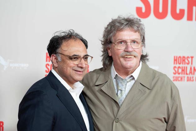 von links: Walid Nakschbandi, Leiter der Filmstiftung NRW, Hape KERKELING in der Rolle des Horst Schlaemmer, Schlämmer, Roter Teppich, Red Carpet Show, Ankunft, arrival, Filmpremiere HORST SCHLAEMMER SUCHT DAS GLUECK, Schlämmer, in der Lichtburg in Essen, 19.03.2026.