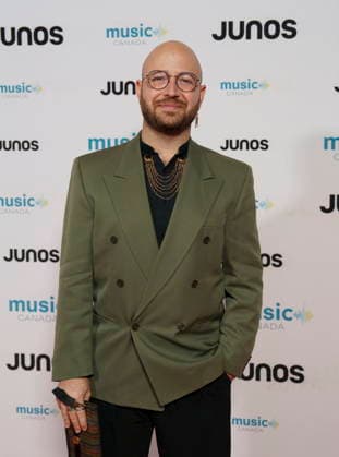 March 28, 2026, Hamilton, On, CANADA: Haitham Haidar, nominated for Classical Album of the Year, Solo Artist, poses on the red carpet at the 2026 Juno Awards Gala in Hamilton, Ont. on Saturday, March 28, 2026. Hamilton CANADA - ZUMAc35_ 20260328_zaf_c35_049 Copyright: xPeterxPowerx