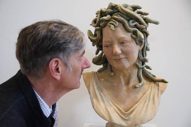 The Society of Portrait Sculptors: FACE 2026 Exhibition at Garrison Chapel, Chelsea Barracks, London, UK - Thursday 9 April 2026 A staff member views Portrait of Medusa by Louise Solecki Weir at Garrison Chapel, Chelsea Barracks, London, England, UK on Thursday 9 April, 2026 as part of The Society of Portrait Sculptors: FACE 2026 Exhibition which runs from 13th - 26th April., Credit:Justin Ng Avalon UK, England, London, Garrison Chapel, Chelsea Barracks Copyright: xJustinxNgx xAvalonx 1089724121