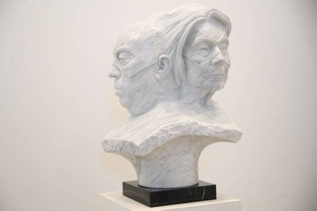 The Society of Portrait Sculptors: FACE 2026 Exhibition at Garrison Chapel, Chelsea Barracks, London, UK - Thursday 9 April 2026 A staff member views A Meeting of Minds by Tim Bates at Garrison Chapel, Chelsea Barracks, London, England, UK on Thursday 9 April, 2026 as part of The Society of Portrait Sculptors: FACE 2026 Exhibition which runs from 13th - 26th April., Credit:Justin Ng Avalon UK, England, London, Garrison Chapel, Chelsea Barracks Copyright: xJustinxNgx xAvalonx 1089724186
