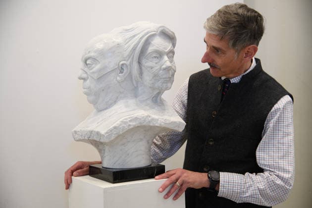 The Society of Portrait Sculptors: FACE 2026 Exhibition at Garrison Chapel, Chelsea Barracks, London, UK - Thursday 9 April 2026 A staff member views A Meeting of Minds by Tim Bates at Garrison Chapel, Chelsea Barracks, London, England, UK on Thursday 9 April, 2026 as part of The Society of Portrait Sculptors: FACE 2026 Exhibition which runs from 13th - 26th April., Credit:Justin Ng Avalon UK, England, London, Garrison Chapel, Chelsea Barracks Copyright: xJustinxNgx xAvalonx 1089724191