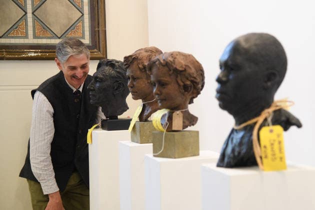 The Society of Portrait Sculptors: FACE 2026 Exhibition at Garrison Chapel, Chelsea Barracks, London, UK - Thursday 9 April 2026 A staff member views (L-R) - Giovanni by Christine Zluhan, Caspar Pennant-Rae by Jane Hamilton, Ivo Pennant-Rae by Jane Hamilton, Denied by Wikje Schoon at Garrison Chapel, Chelsea Barracks, London, England, UK on Thursday 9 April, 2026 as part of The Society of Portrait Sculptors: FACE 2026 Exhibition which runs from 13th - 26th April., Credit:Justin Ng Avalon UK, England, London, Garrison Chapel, Chelsea Barracks Copyright: xJustinxNgx xAvalonx 1089724248