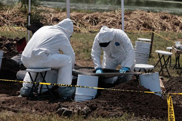 April 14, 2026, Mexico City, Cdmx, Mexico: Between the borders of the Tlahuac region of Mexico City and Chalco, State of Mexico, lie the lagoons that divide these areas. Within a particular zone known as Lagunas de La Habana (Havana Lagoons), more than 500 human skeletal remains (teeth and bones from different parts of the body) have been found to date, buried in the mud at a very shallow depth. This is because it is a chinampa (floating garden) area, making it impossible that this area was used as a cemetery. The remains are found at a very shallow depth; after only 20 centimeters, the water reaches the lagoon. The search continues, carried out by personnel from the Attorney General s Offices, police, the National Guard, and the State - ZUMAp204 20260414_zip_p204_018 Copyright: xJosuexPerezx