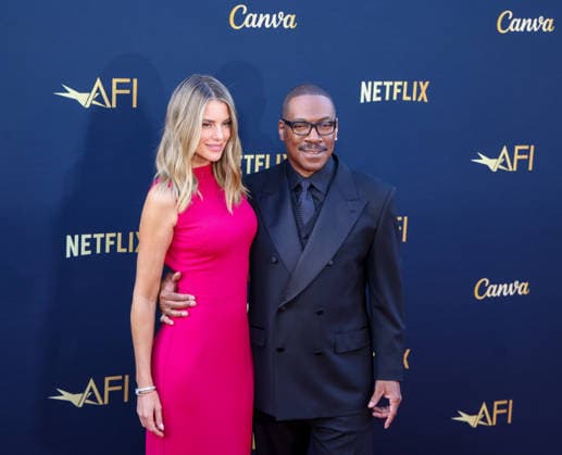 April 18, 2026, Hollywood, California, USA: American Actor and Comedian EDDIE MURPHY, 65, and his Australian Actress wife PAIGE BUTCHER, 46, in a Barbie-pink dress, is on the Red Carpet before Murphy receives the American Film Instituteâ€⠢s (AFI) Life Time Achievement Award on April 18, 2026 in Hollywood, California at the Dolby Theater, Los Angeles. The event is sponsored by Netflix. Hollywood USA - ZUMAk144 20260418_znp_k144_010 Copyright: xAmyxKatzx