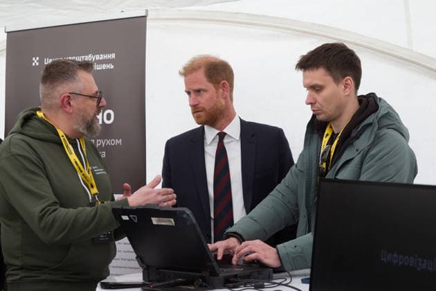 Prince Harry (C), The Duke of Sussex, gets familiar with Ukrainian innovations in the field of digitalisation and UAV management while talking with team members of the Center for Scaling Technology Solutions at their booth in the mobile town during the Invictus Games Ukraine Forum, dedicated to the 10th anniversary of the Invictus Games movement in Ukraine, at the National Museum of the History of Ukraine in WWII Memorial Complex, Kyiv, Ukraine, April 24, 2026. Ukraine has participated in the Invictus Games since 2017, showing strong results and steady team growth. The Ukrainian team competes in athletics, archery, rowing, and swimming, earning numerous medals and prize placements. (Photo by Danylo Antoniuk Ukrinform) Invictus Games Ukraine Copyright: xKirillxChubotinx