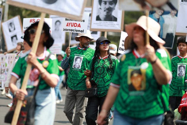 March of National Dignity in Mexico City MEXICO CITY, MEXICO - MAY 10: Relatives of missing persons, wearing football jerseys printed with the images of their disappeared loved ones, hold pictures during the March of National Dignity, on Reforma avenue, in Mexico City, Mexico, on May 10, 2026. Framed by the World Cup year, mothers of missing persons held a march on Mother s Day to raise awareness about the crisis of disappearances in Mexico and to demand justice under the slogan the mothers will reach the final while the number of missing persons in the country exceeds 130,000. Daniel Cardenas Anadolu Mexico City Mexico. Editorial use only. Please get in touch for any other usage. Copyright: x2026xAnadoluxDanielxCardenasx