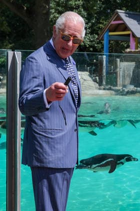 July 9, 2026, London, London, UK: London, UK. King Charles III jokes with the crowd while holding a laser pointer used to attract Humboldt penguins at Penguin Beach during a visit to London Zoo marking the 200th anniversary of the Zoological Society of London. London UK - ZUMAl94_ 20260709_zaf_l94_015 Copyright: xDinendraxHariax
