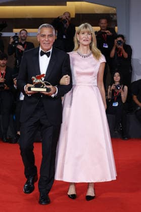 Venise 2026 Ink Screening George Clooney Golden Lion NB George Clooney poses with Laura Dern after receiving the Golden Lion for Lifetime Achievement Award attending the Ink Red carpet Opening Ceremony as part of the 83th Venice International Film Festival at the Lido in Venice, Italy on September 02, 2026. Photo by Nasser Berzane ABACAPRESS.COM Venise Copyright: xBerzanexNasser ABACAx