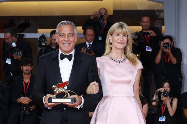 Venise 2026 Ink Screening George Clooney Golden Lion NB George Clooney poses with Laura Dern after receiving the Golden Lion for Lifetime Achievement Award attending the Ink Red carpet Opening Ceremony as part of the 83th Venice International Film Festival at the Lido in Venice, Italy on September 02, 2026. Photo by Nasser Berzane ABACAPRESS.COM Venise Copyright: xBerzanexNasser ABACAx
