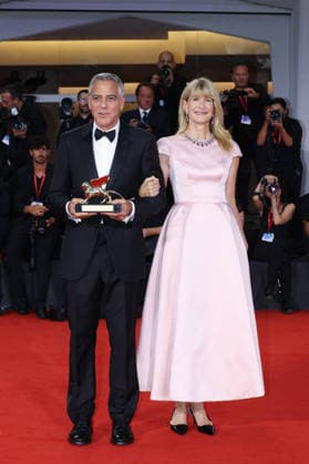 Venise 2026 Ink Screening George Clooney Golden Lion NB George Clooney poses with Laura Dern after receiving the Golden Lion for Lifetime Achievement Award attending the Ink Red carpet Opening Ceremony as part of the 83th Venice International Film Festival at the Lido in Venice, Italy on September 02, 2026. Photo by Nasser Berzane ABACAPRESS.COM Venise Copyright: xBerzanexNasser ABACAx