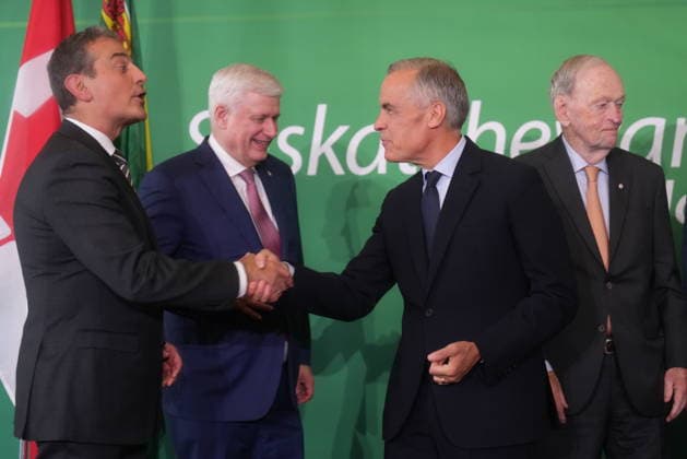 September 14, 2026, Toronto, On, Canada: Bell Canada CEO Mirko Bibic, left, shakes hands with Prime Minister Mark Carney as former prime ministers Stephen Harper, second from left, and Jean Chro tien look on at Canada s national investment summit, in Toronto, on Monday, Sept. 14, 2026. Toronto Canada - ZUMAc35_ 20260914_zaf_c35_073 Copyright: xNathanxDenettex