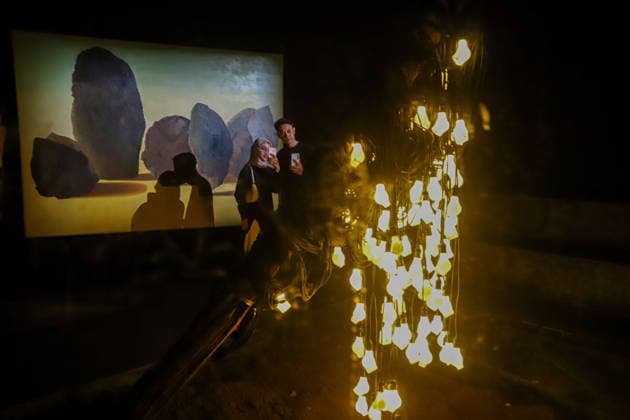 September 20, 2026, Surabaya, East Java, Indonesia: A visitor takes a photo of a contemporary artwork at the ArtSubs 2026 exhibition at Balai Pemuda, Surabaya, East Java, Indonesia, on September 20, 2026. Titled border, threshold, beyond, the art exhibition features 500 works by 113 artists from across Indonesia, serving as a response to the public s need for a space of contemplation, reflection, and entertainment. Surabaya Indonesia - ZUMAp290 20260920_zip_p290_011 Copyright: xRendyxAgungxPrakosox