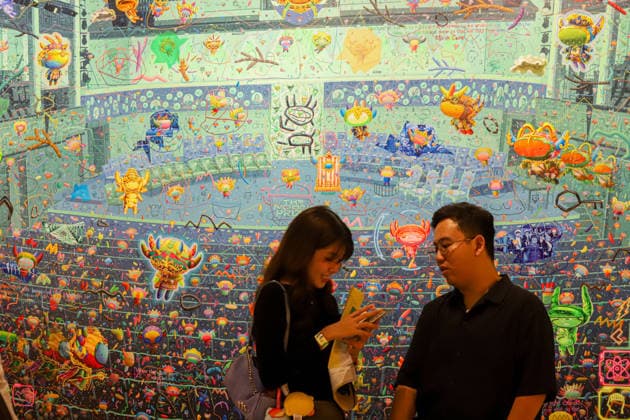 September 20, 2026, Surabaya, East Java, Indonesia: Visitors observe contemporary artworks at the ArtSubs 2026 exhibition at Balai Pemuda, Surabaya, East Java, Indonesia, on September 20, 2026. Titled border, threshold, beyond, the art exhibition features 500 works by 113 artists from across Indonesia, serving as a response to the public s need for a space of contemplation, reflection, and entertainment. Surabaya Indonesia - ZUMAp290 20260920_zip_p290_021 Copyright: xRendyxAgungxPrakosox
