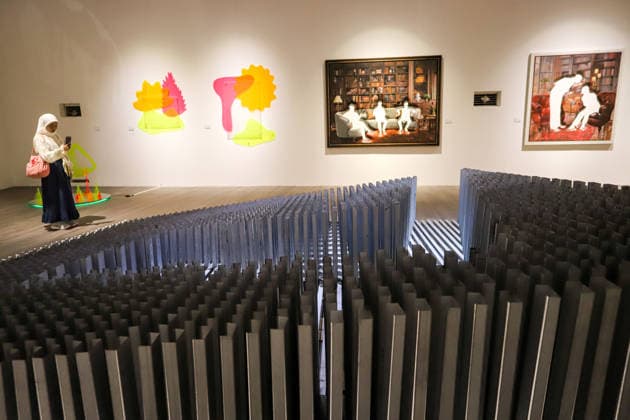 September 20, 2026, Surabaya, East Java, Indonesia: A visitor takes a photo of a contemporary artwork at the ArtSubs 2026 exhibition at Balai Pemuda, Surabaya, East Java, Indonesia, on September 20, 2026. Titled border, threshold, beyond, the art exhibition features 500 works by 113 artists from across Indonesia, serving as a response to the public s need for a space of contemplation, reflection, and entertainment. Surabaya Indonesia - ZUMAp290 20260920_zip_p290_024 Copyright: xRendyxAgungxPrakosox