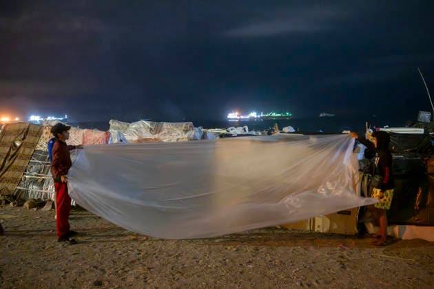 Rain Affects the Beach Settlements at El Trampolín in Ceuta; Migrants Spend the Night on the Beaches of El Trampolín and Benítez, September 28, 2026, in Ceuta, Spain. Around 3,000 migrants remain in makeshift settlements on Ceuta’s beaches following the massive influx recorded in late July. Continuous rain has flooded the ground and damaged the shacks built from reeds, plastic, cardboard, and sheets on El Trampolín Beach. SEPTEMBER 28, 2026, Ceuta, Spain Copyright: xMarcosxMorenox 7806883