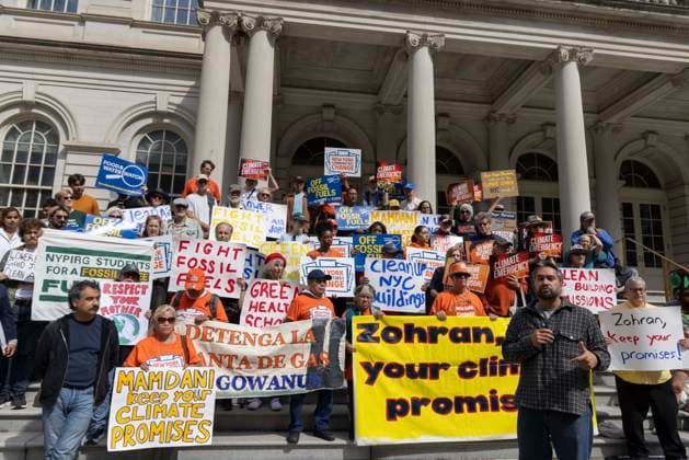 September 30, 2026, New York, New York, USA: JONATHAN WESTIN with Climate Defenders speaks. Environmental advocates rally on the City Hall steps calling for Mayor Mamdani to keep his campaign promises to decarbonize New York City. Participants hold signs that read MAMDANI KEEP YOUR CLIMATE PROMISES FIGHT FOSSIL FUELS Clean up NYC Buildings CLIMATE EMERGENCY. Organizers call for the mayor to close the loophole in NYCâ€⠢s primary climate law, Local Law 97, to invest in green healthy public schools, fight fossil fuel infrastructure and fracked gas power plants. Participating organizations are Food & Water Watch, ALIGN, TREEage, NYPIRG, Rise & Resist, New York Communities for Change, Sunrise Movement NYC, Climate Defenders, Climate - ZUMAr174 20260930_znp_r174_041 Copyright: xGinaxMxRandazzox
