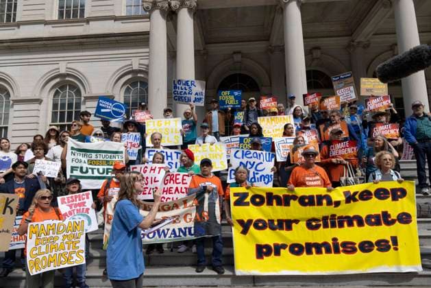 September 30, 2026, New York, New York, USA: Environmental advocates rally on the City Hall steps calling for Mayor Mamdani to keep his campaign promises to decarbonize New York City. Participants hold signs and banners that read Zohran, keep your climate promises! LOWER BILLS CLEAN AIR GREEN JOBS CLIMATE EMERGENCY. Organizers call for the mayor to close the loophole in NYCâ€⠢s primary climate law, Local Law 97, to invest in green healthy public schools, fight fossil fuel infrastructure and fracked gas power plants. Participating organizations are Food & Water Watch, ALIGN, TREEage, NYPIRG, Rise & Resist, New York Communities for Change, Sunrise Movement NYC, Climate Defenders, Climate Defiance and Hot Girls Organize. New York U - ZUMAr174 20260930_znp_r174_051 Copyright: xGinaxMxRandazzox